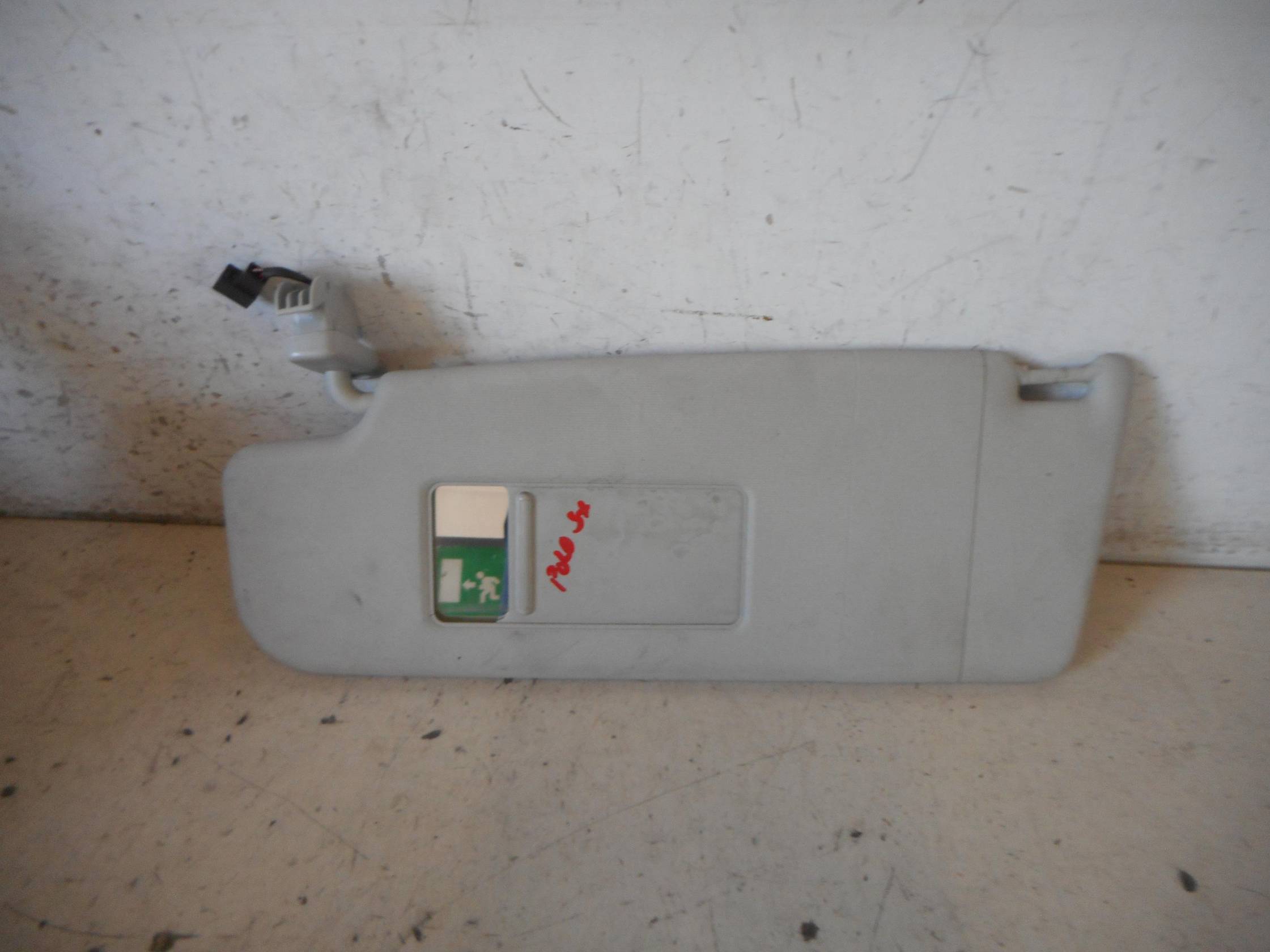 Aletta parasole parabrezza sx.